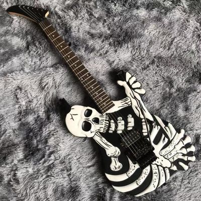 China Top Quality 6 Strings Bones Black Skull Electric Guitar supplier